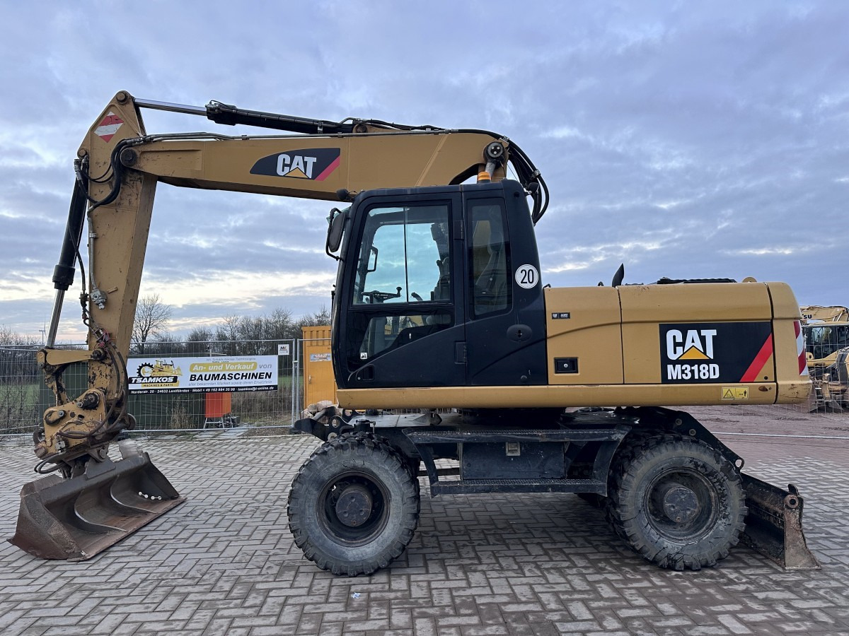 CATERPILLAR M 318 D full Hydr. Top Zustand German machine ! - حفارة على عجلات: صور 1 CATERPILLAR M 318 D full Hydr. Top Zustand German machine ! - حفارة على عجلات: صور 1