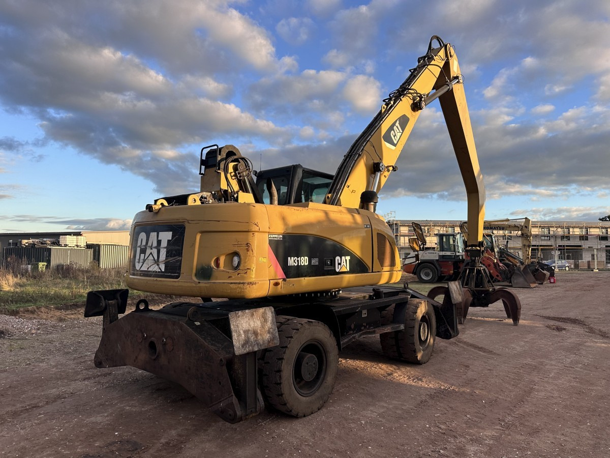 CATERPILLAR M 318 MH mit Greifer Kein 3022 3026 320 322 - حفارة النقل والشحن: صور 3 CATERPILLAR M 318 MH mit Greifer Kein 3022 3026 320 322 - حفارة النقل والشحن: صور 3