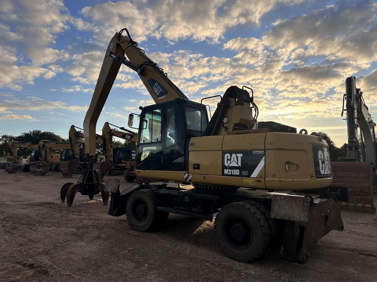 CATERPILLAR M 318 MH mit Greifer Kein 3022 3026 320 322 - حفارة على عجلات: صور 4 CATERPILLAR M 318 MH mit Greifer Kein 3022 3026 320 322 - حفارة على عجلات: صور 4