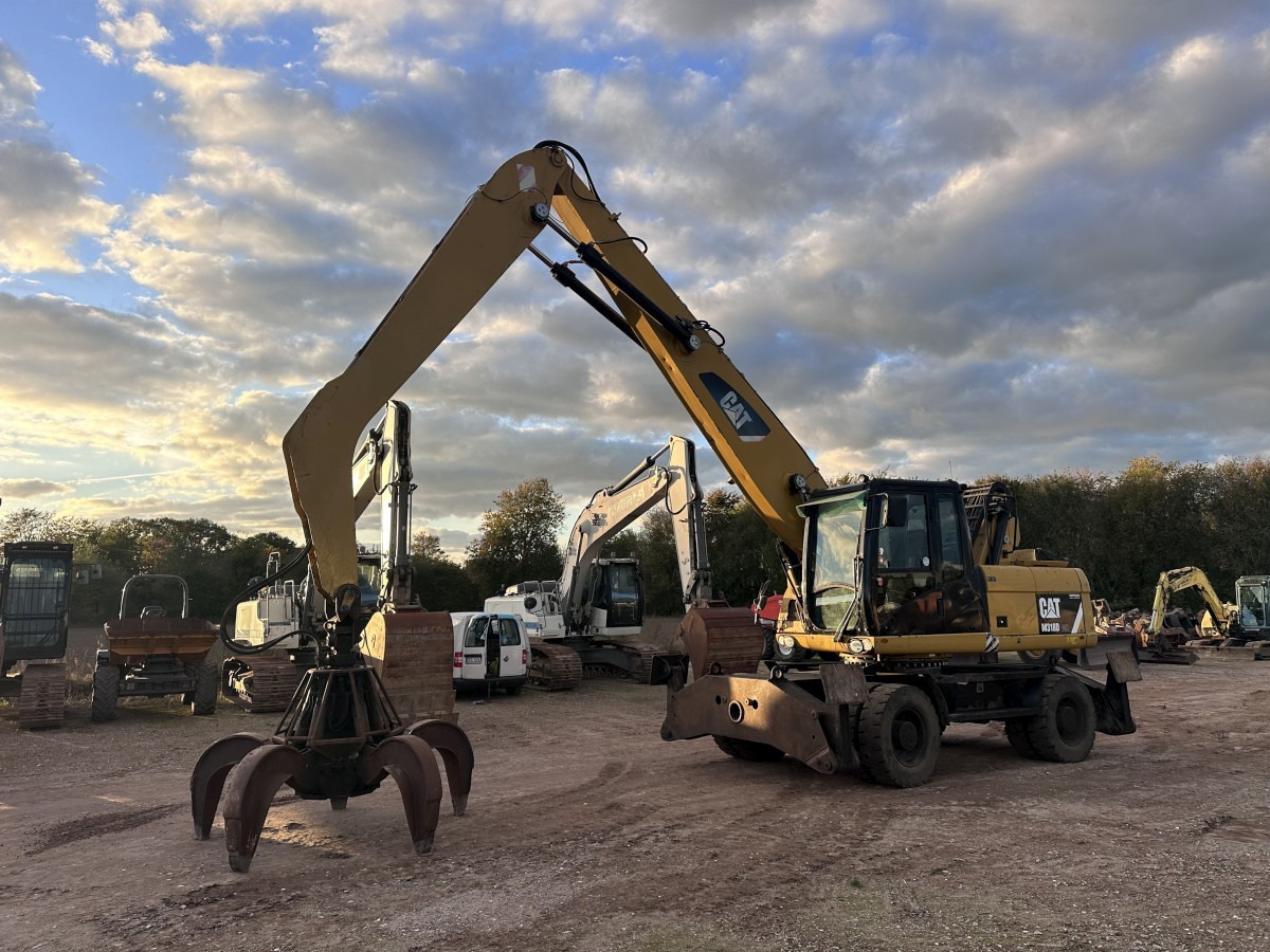 CATERPILLAR M 318 MH mit Greifer Kein 3022 3026 320 322 - حفارة على عجلات: صور 1 CATERPILLAR M 318 MH mit Greifer Kein 3022 3026 320 322 - حفارة على عجلات: صور 1