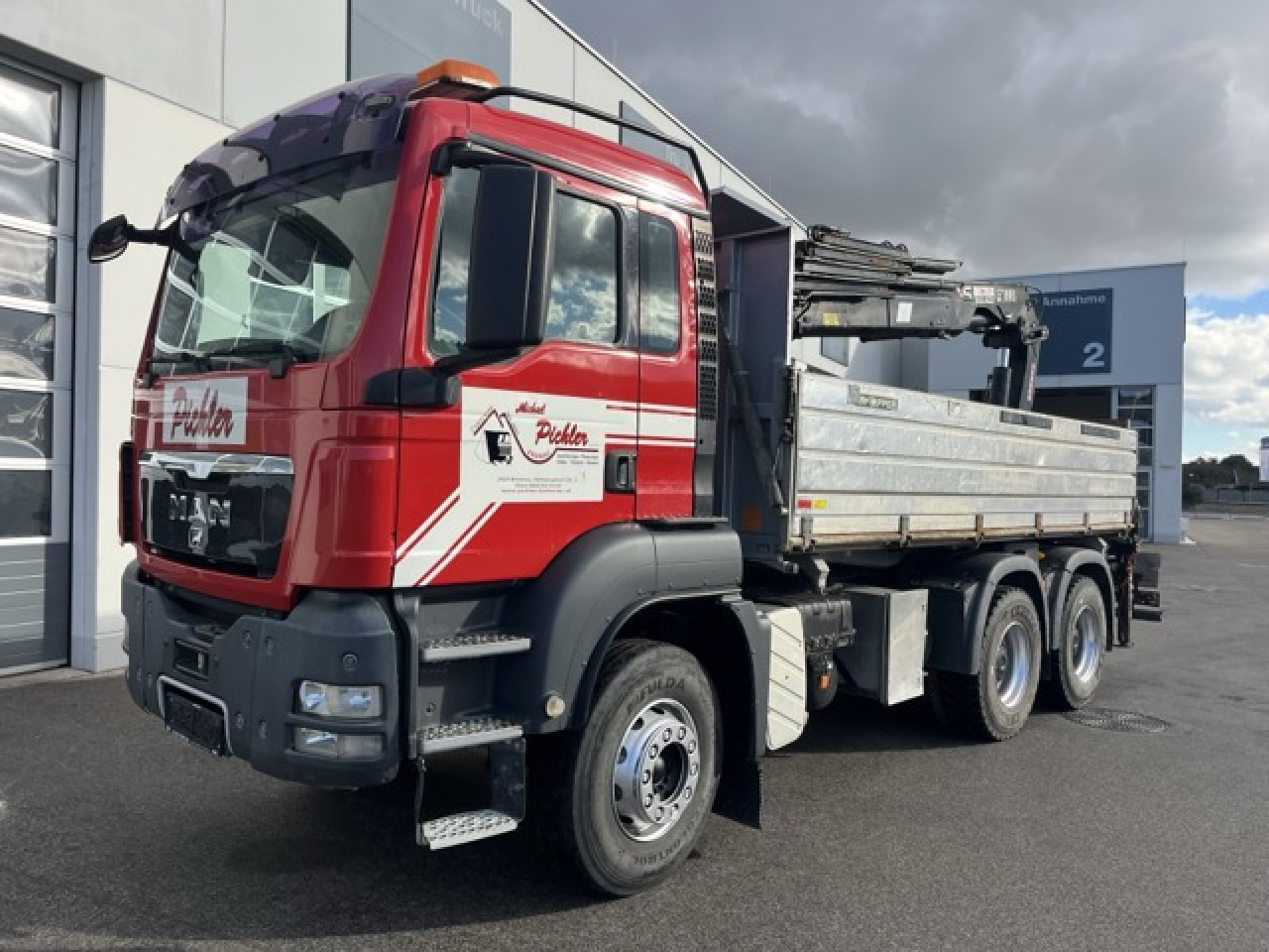MAN TGS 33.440 6x4 BB mit Heckkran HIAB 166ES-4 Euro5 - قلابات, شاحنة كرين: صور 1 MAN TGS 33.440 6x4 BB mit Heckkran HIAB 166ES-4 Euro5 - قلابات, شاحنة كرين: صور 1