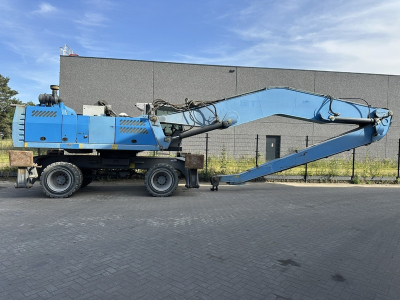 Fuchs MHL 360 OVERSLAGKRAAN / MATERIAL HANDLER / UMSCHLAGBAGGER - TOP ZUSTAND - حفارة النقل والشحن: صور 1 Fuchs MHL 360 OVERSLAGKRAAN / MATERIAL HANDLER / UMSCHLAGBAGGER - TOP ZUSTAND - حفارة النقل والشحن: صور 1