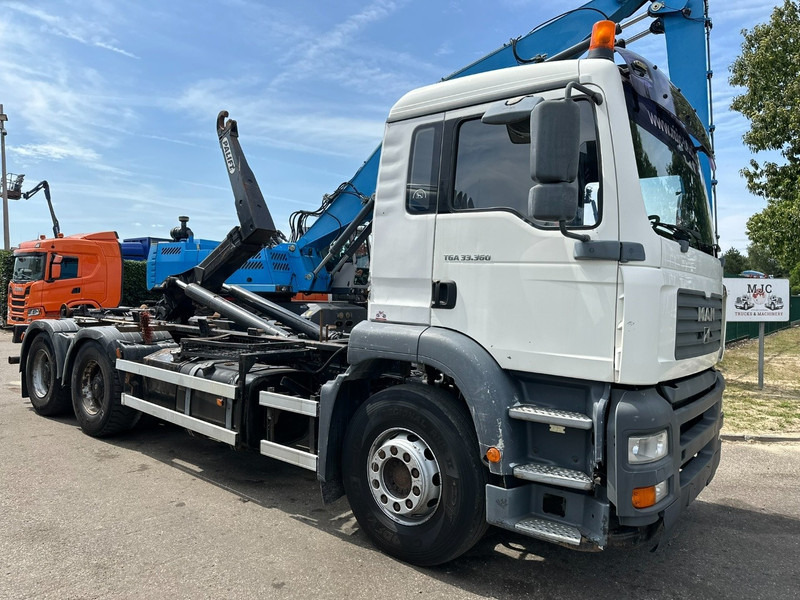 MAN TGA 33.360 6x4 HOOKLIFT - MANUAL ZF - BIG AXLES HUB REDUCTION / STEEL SPRING - BE TRUCK - شاحنة ذات الخطاف: صور 1 MAN TGA 33.360 6x4 HOOKLIFT - MANUAL ZF - BIG AXLES HUB REDUCTION / STEEL SPRING - BE TRUCK - شاحنة ذات الخطاف: صور 1