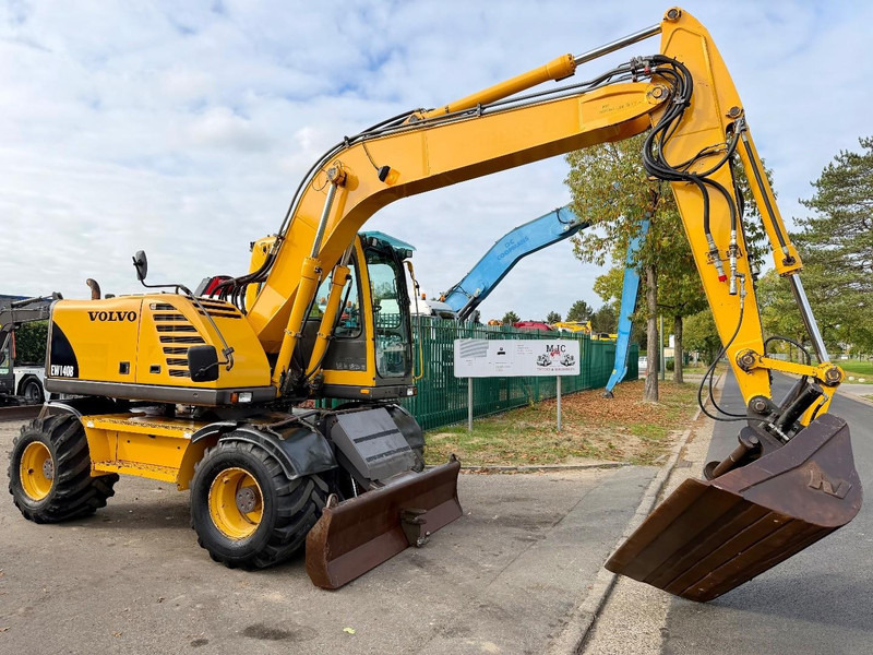 Volvo EW 140 B *FULL HYDR* - BLADE - 10.485h - TILT BUCKET - CE - NL MACHINE - GOOD CONDITION - حفارة على عجلات: صور 1 Volvo EW 140 B *FULL HYDR* - BLADE - 10.485h - TILT BUCKET - CE - NL MACHINE - GOOD CONDITION - حفارة على عجلات: صور 1
