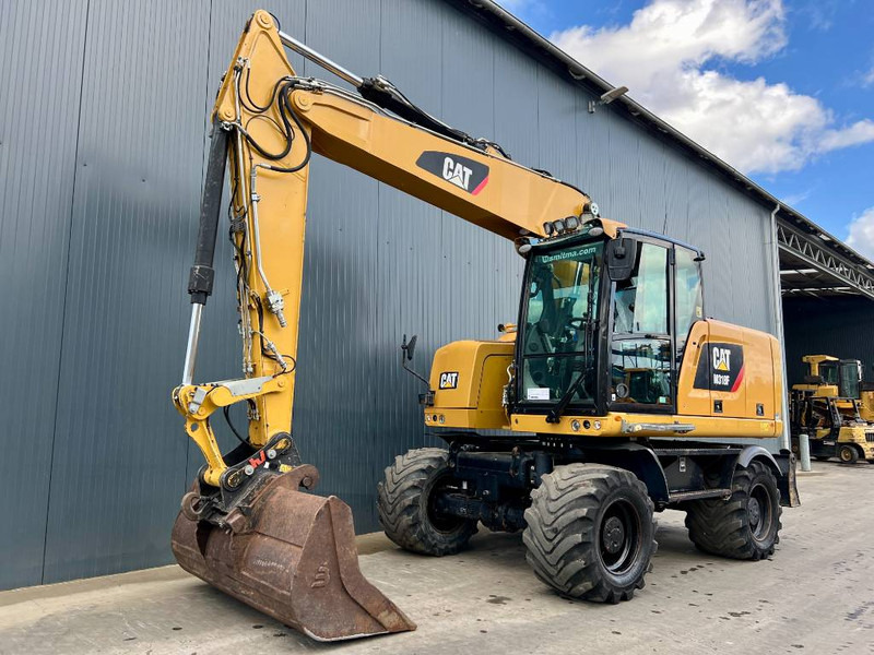 Cat M318F - حفارة على عجلات: صور 1 Cat M318F - حفارة على عجلات: صور 1