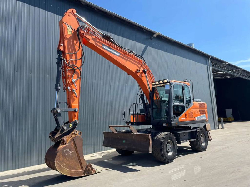 Doosan DX170W-5 - حفارة على عجلات: صور 1 Doosan DX170W-5 - حفارة على عجلات: صور 1