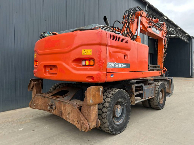 Doosan DX210W - حفارة على عجلات: صور 4 Doosan DX210W - حفارة على عجلات: صور 4