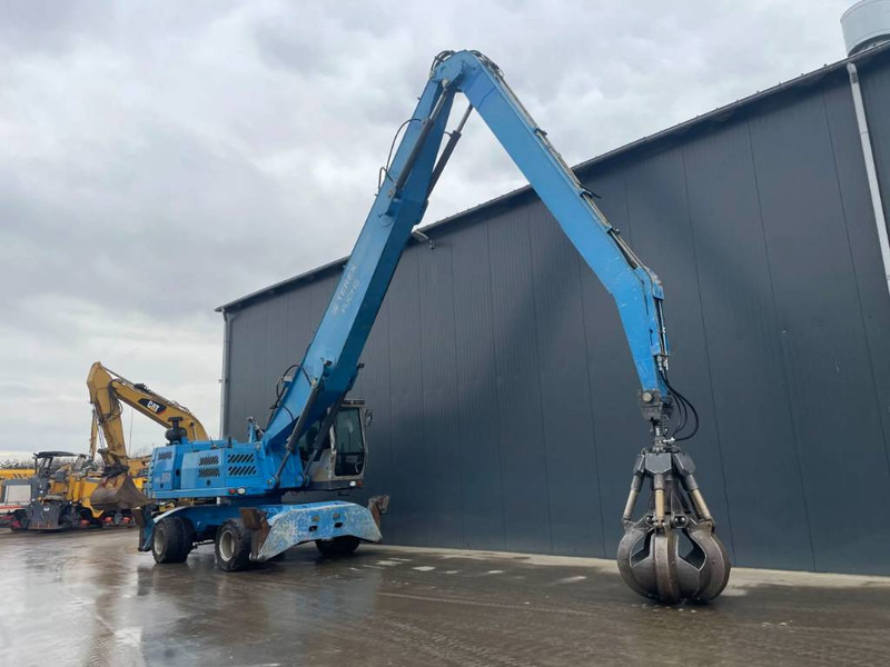 Fuchs MHL350 - حفارة النقل والشحن: صور 4 Fuchs MHL350 - حفارة النقل والشحن: صور 4