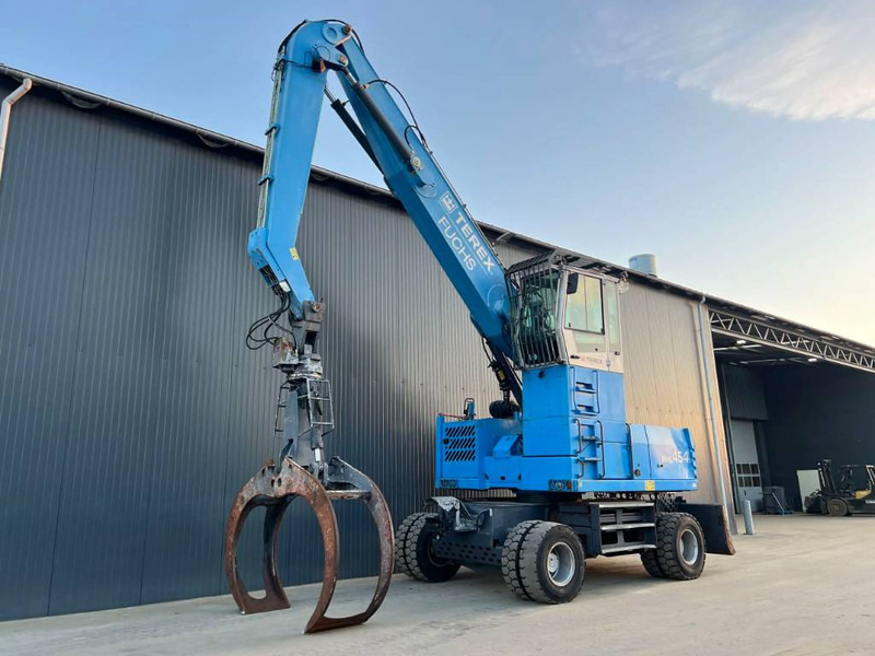 Fuchs MHL454 - حفارة النقل والشحن: صور 1 Fuchs MHL454 - حفارة النقل والشحن: صور 1