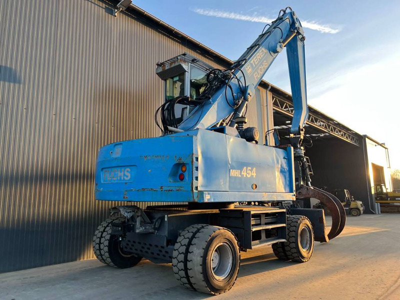 Fuchs MHL454 - حفارة النقل والشحن: صور 4 Fuchs MHL454 - حفارة النقل والشحن: صور 4