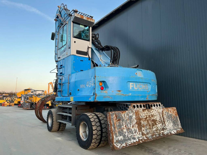 Fuchs MHL454 - حفارة النقل والشحن: صور 2 Fuchs MHL454 - حفارة النقل والشحن: صور 2
