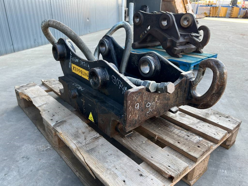 OilQuick OQ65 - 311F / 313F / 315F - وصلة الربط للمعدات المعلقة - آلات البناء: صور 3 OilQuick OQ65 - 311F / 313F / 315F - وصلة الربط للمعدات المعلقة - آلات البناء: صور 3