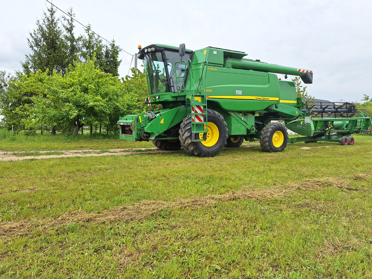 John Deere T550 - حصادة شاملة: صور 5 John Deere T550 - حصادة شاملة: صور 5