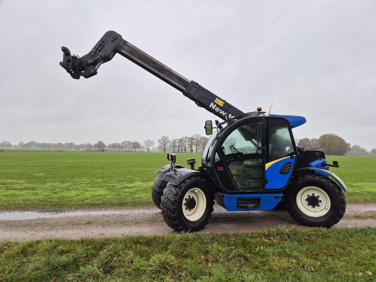 NEW HOLLAND LM 5040 - آلات البناء: صور 5 NEW HOLLAND LM 5040 - آلات البناء: صور 5