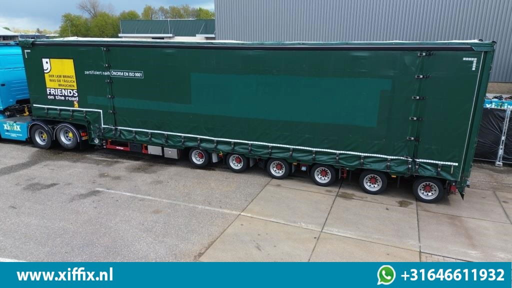 Meusburger 6-ass. Semi dieplader met elektische huifopbouw / 3x naloop gestuurd - عربة مسطحة منخفضة نصف مقطورة: صور 2 Meusburger 6-ass. Semi dieplader met elektische huifopbouw / 3x naloop gestuurd - عربة مسطحة منخفضة نصف مقطورة: صور 2