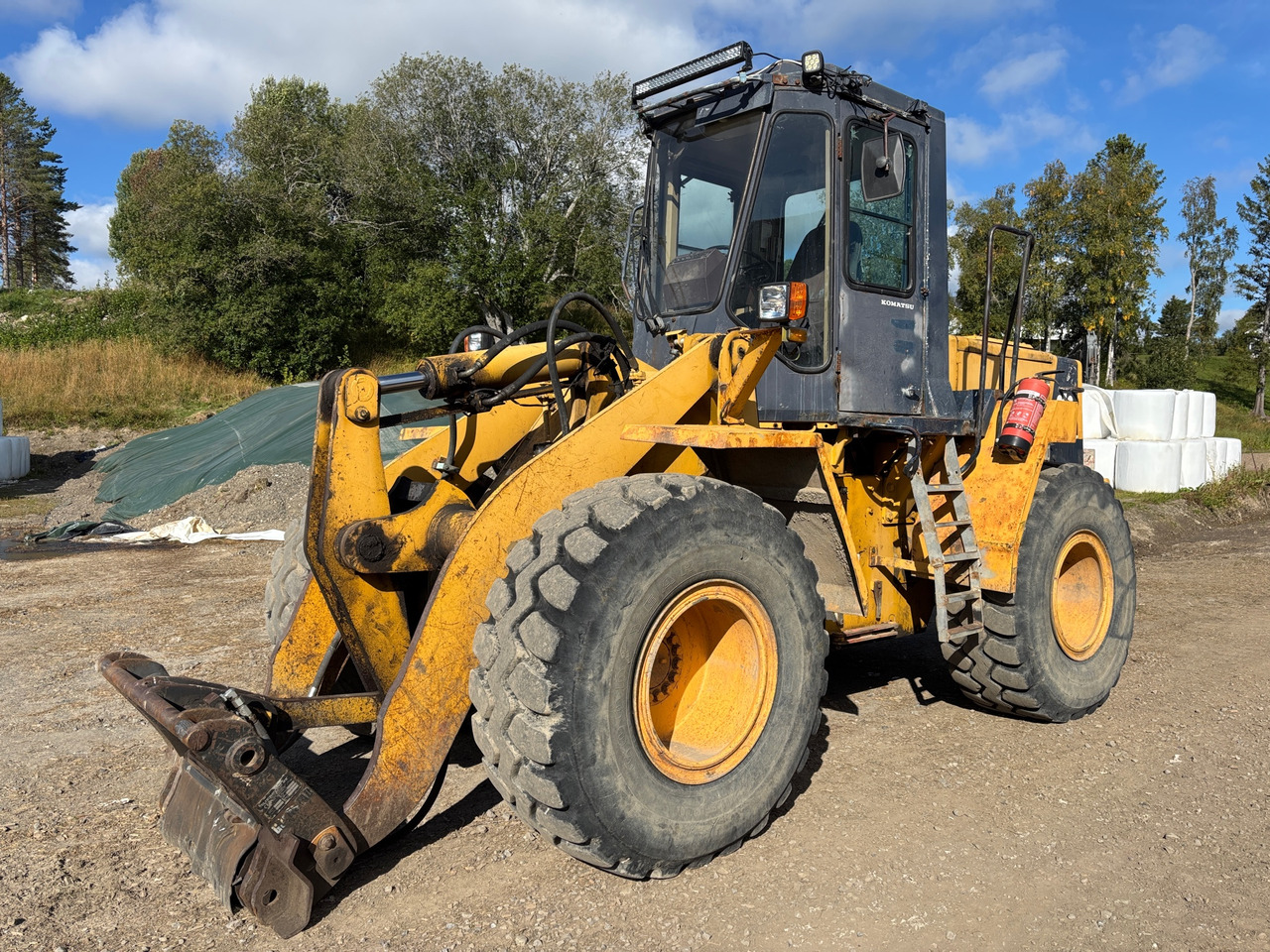 Komatsu WA 250 - 1H - اللودر بعجل: صور 1 Komatsu WA 250 - 1H - اللودر بعجل: صور 1