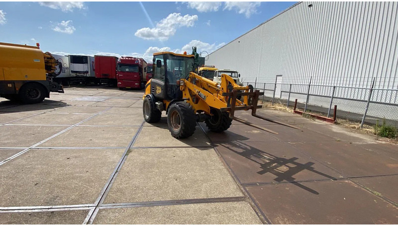 JCB KNIKSCHOVEL 406 - اللودر بعجل: صور 1 JCB KNIKSCHOVEL 406 - اللودر بعجل: صور 1