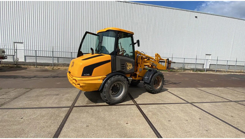 JCB KNIKSCHOVEL 406 - اللودر بعجل: صور 4 JCB KNIKSCHOVEL 406 - اللودر بعجل: صور 4