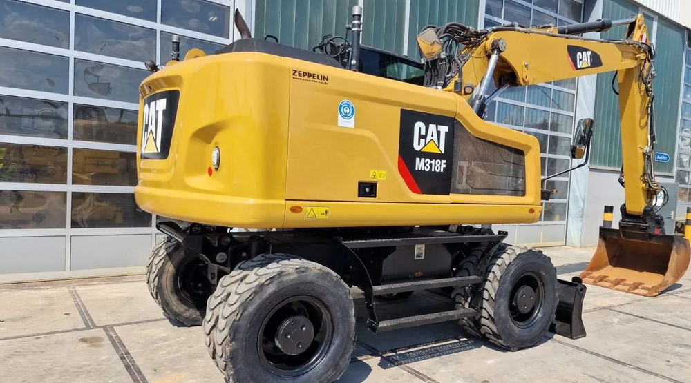 Caterpillar M318F, 2019 ROK, IMPORT NIEMCY - حفارة على عجلات: صور 1 Caterpillar M318F, 2019 ROK, IMPORT NIEMCY - حفارة على عجلات: صور 1