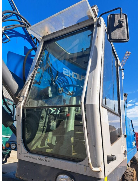 Fuchs MHL 340 D - حفارة النقل والشحن: صور 4 Fuchs MHL 340 D - حفارة النقل والشحن: صور 4