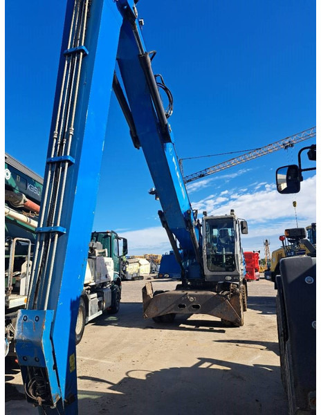 Fuchs MHL 340 D - حفارة النقل والشحن: صور 3 Fuchs MHL 340 D - حفارة النقل والشحن: صور 3