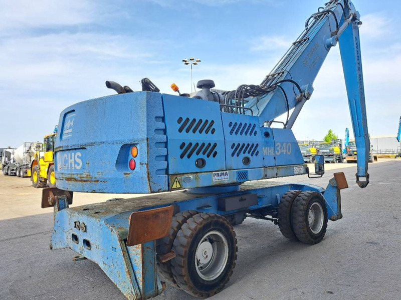 Fuchs MHL 340 D - حفارة النقل والشحن: صور 3 Fuchs MHL 340 D - حفارة النقل والشحن: صور 3