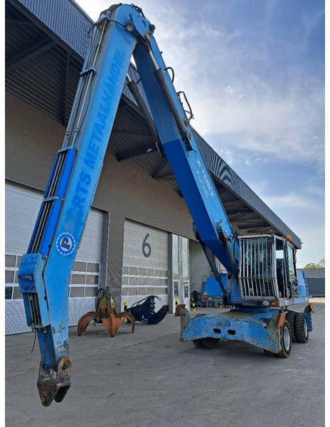 Fuchs MHL 340 D - حفارة النقل والشحن: صور 4 Fuchs MHL 340 D - حفارة النقل والشحن: صور 4