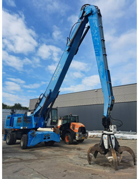 Fuchs MHL 360 D - حفارة النقل والشحن: صور 3 Fuchs MHL 360 D - حفارة النقل والشحن: صور 3