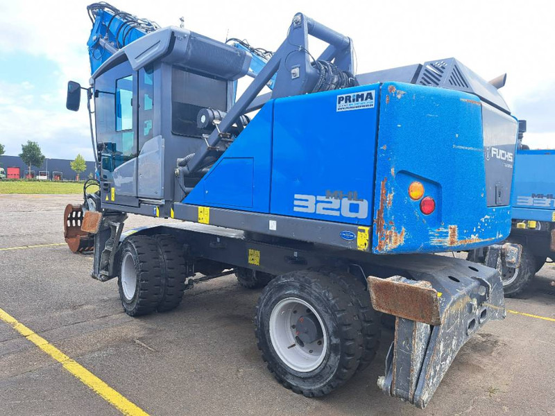 Fuchs MHL320F + Grapple - حفارة النقل والشحن: صور 4 Fuchs MHL320F + Grapple - حفارة النقل والشحن: صور 4
