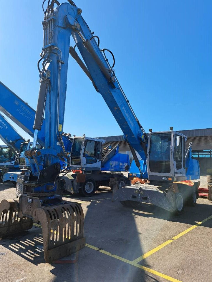 Fuchs MHL331E + Grapple - حفارة النقل والشحن: صور 4 Fuchs MHL331E + Grapple - حفارة النقل والشحن: صور 4