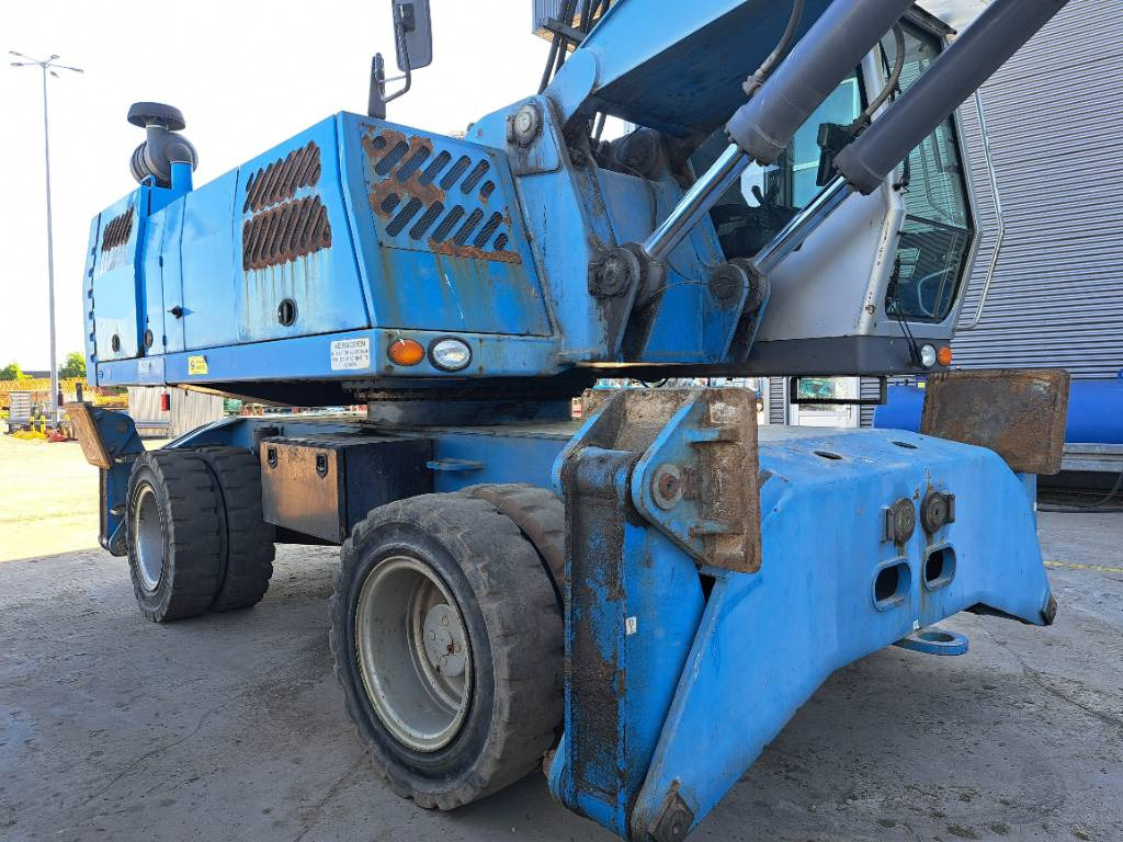 Fuchs MHL360D - حفارة النقل والشحن: صور 5 Fuchs MHL360D - حفارة النقل والشحن: صور 5