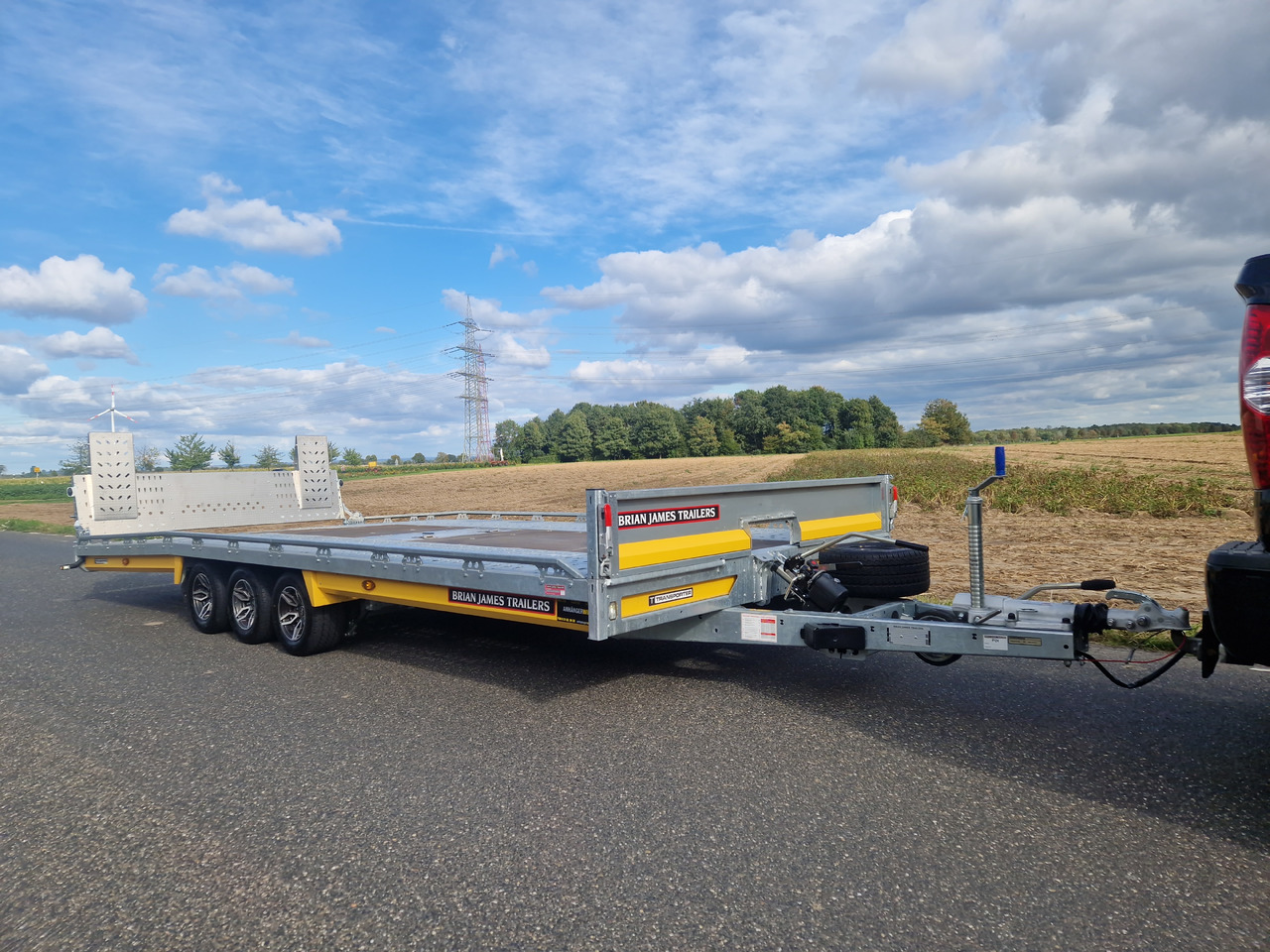 BJT T Transporter 231 550x224cm yellow ankippbar Heckrampe Tridem Alufelgen 10" 3500kg - شاحنة نقل سيارات مقطورة: صور 3 BJT T Transporter 231 550x224cm yellow ankippbar Heckrampe Tridem Alufelgen 10" 3500kg - شاحنة نقل سيارات مقطورة: صور 3