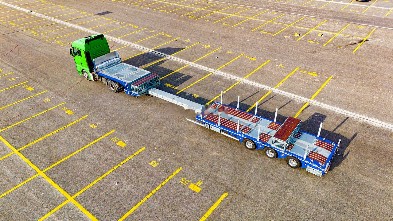 STU 3 Axle Hydraulic Steering Low Loader - عربة مسطحة منخفضة نصف مقطورة: صور 3 STU 3 Axle Hydraulic Steering Low Loader - عربة مسطحة منخفضة نصف مقطورة: صور 3