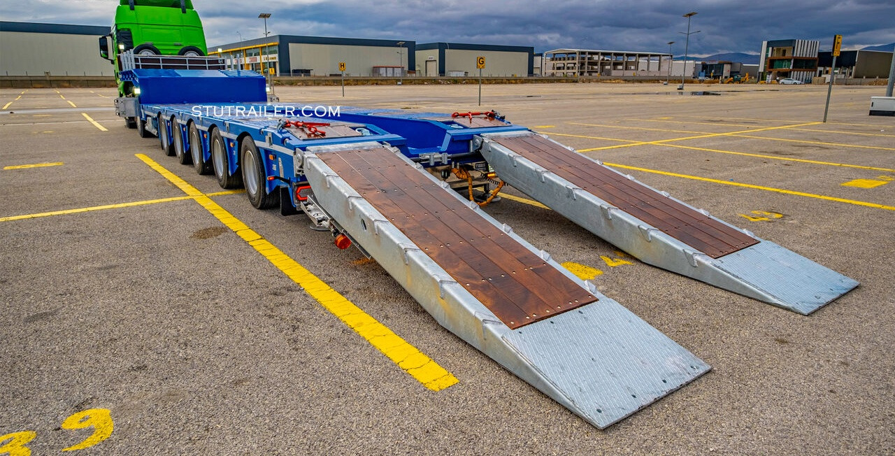 STU 5 Axle Hydraulic Steering Lowbed - عربة مسطحة منخفضة نصف مقطورة: صور 2 STU 5 Axle Hydraulic Steering Lowbed - عربة مسطحة منخفضة نصف مقطورة: صور 2