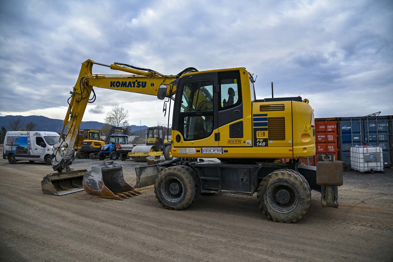 KOMATSU PW148-10 - حفارة على عجلات: صور 3 KOMATSU PW148-10 - حفارة على عجلات: صور 3