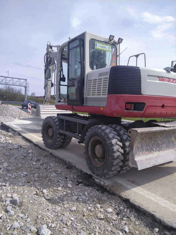 Takeuchi TB1160W - حفارة على عجلات: صور 4 Takeuchi TB1160W - حفارة على عجلات: صور 4