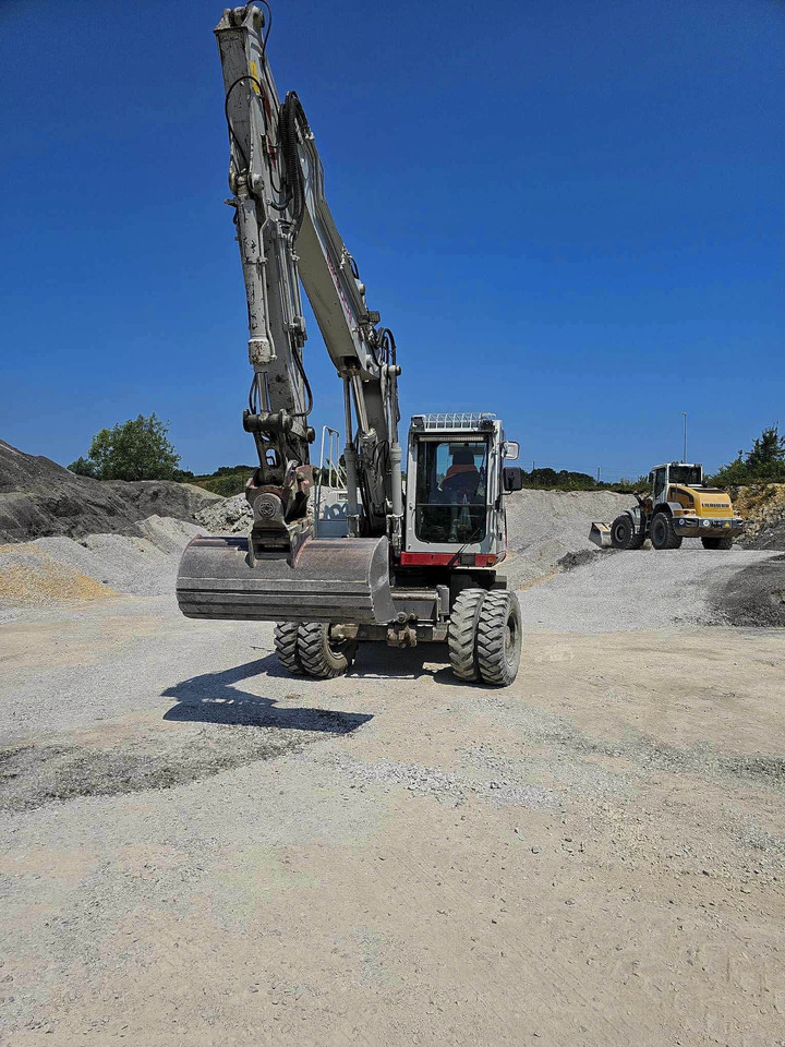 Takeuchi TB1160W - حفارة على عجلات: صور 2 Takeuchi TB1160W - حفارة على عجلات: صور 2