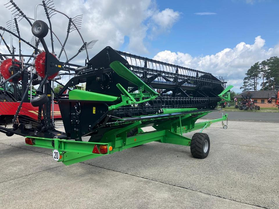 Deutz Fahr Schneidwerk DH540A inkl Schneidwerkwagen Mähdrescher - حصادة شاملة - الرأس: صور 1 Deutz Fahr Schneidwerk DH540A inkl Schneidwerkwagen Mähdrescher - حصادة شاملة - الرأس: صور 1