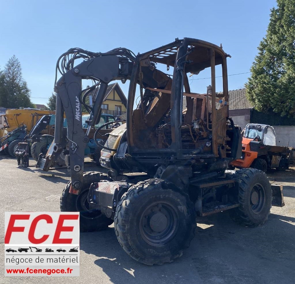 Mecalac 7 MWR Origine Française endommagée - حفارة على عجلات: صور 1 Mecalac 7 MWR Origine Française endommagée - حفارة على عجلات: صور 1