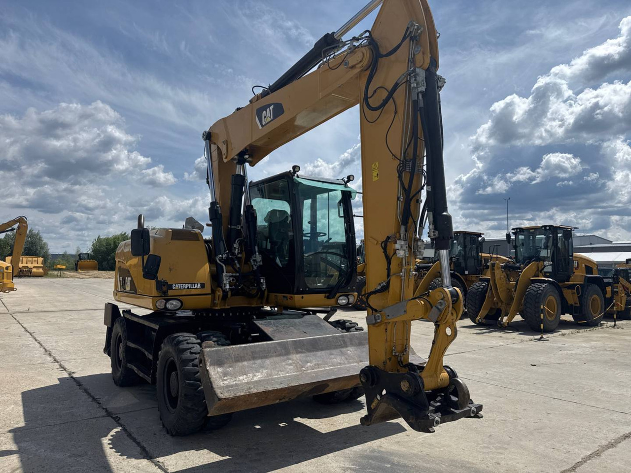 CAT M313D - حفارة على عجلات: صور 2 CAT M313D - حفارة على عجلات: صور 2