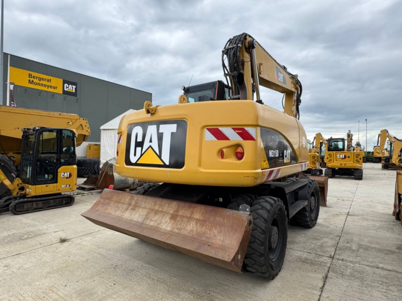 CAT M315D - حفارة على عجلات: صور 3 CAT M315D - حفارة على عجلات: صور 3