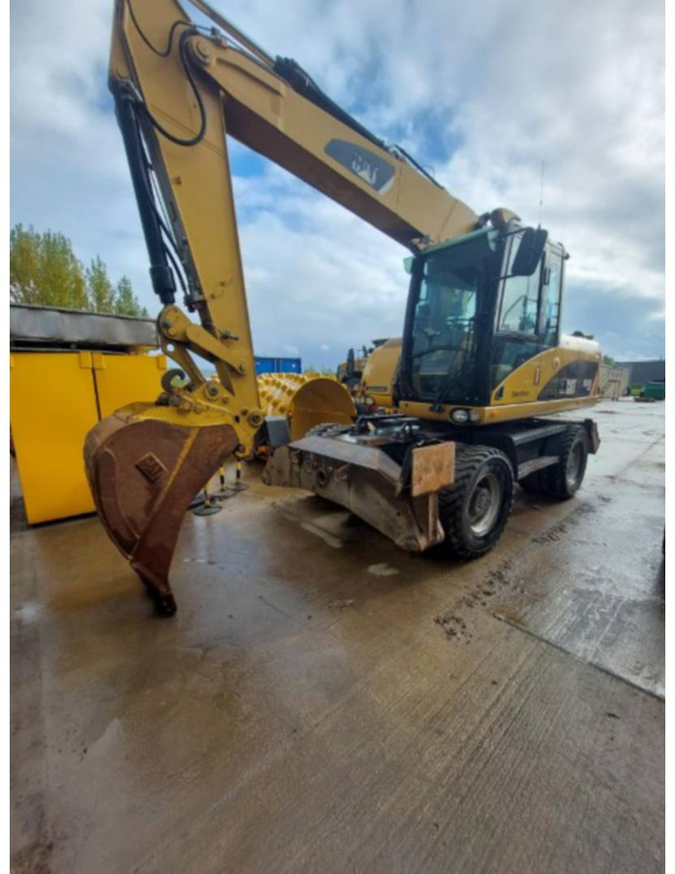 CAT M315D - حفارة على عجلات: صور 1 CAT M315D - حفارة على عجلات: صور 1