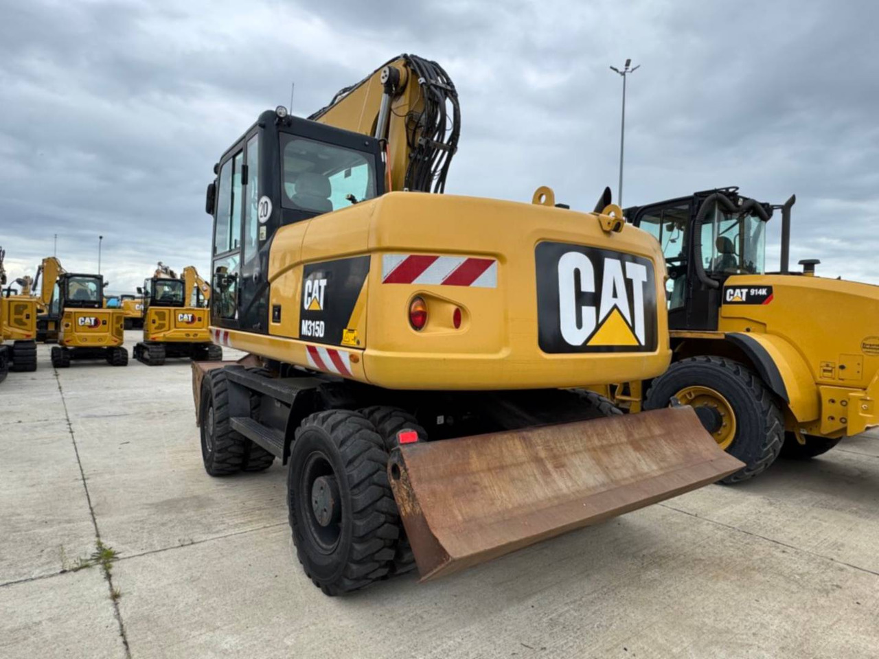 CAT M315D - حفارة على عجلات: صور 4 CAT M315D - حفارة على عجلات: صور 4