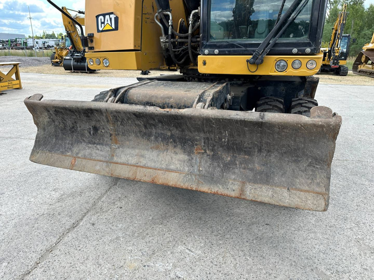 حفارة على عجلات CAT M318F: صور 16