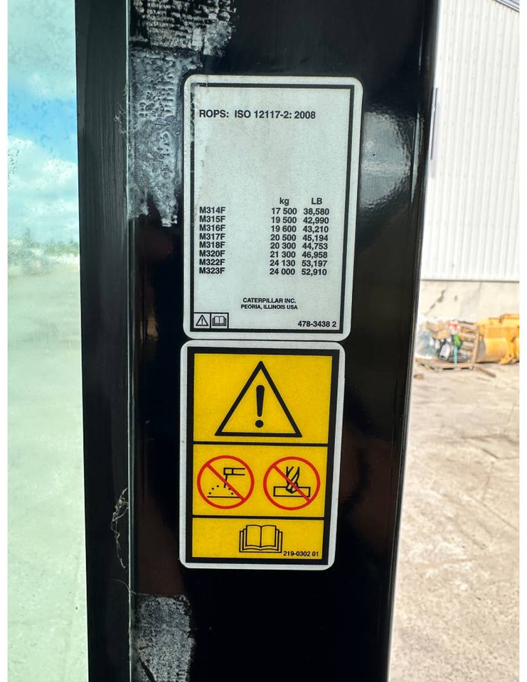 حفارة على عجلات CAT M318F: صور 8