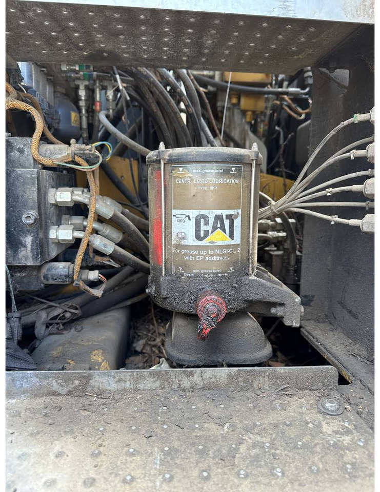 حفارة على عجلات CAT M318F: صور 24