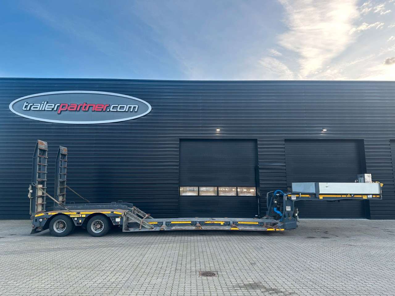 Faymonville 2 achs tiefbett / ausziehbar / Forstmaschinen - عربة مسطحة منخفضة نصف مقطورة: صور 1 Faymonville 2 achs tiefbett / ausziehbar / Forstmaschinen - عربة مسطحة منخفضة نصف مقطورة: صور 1