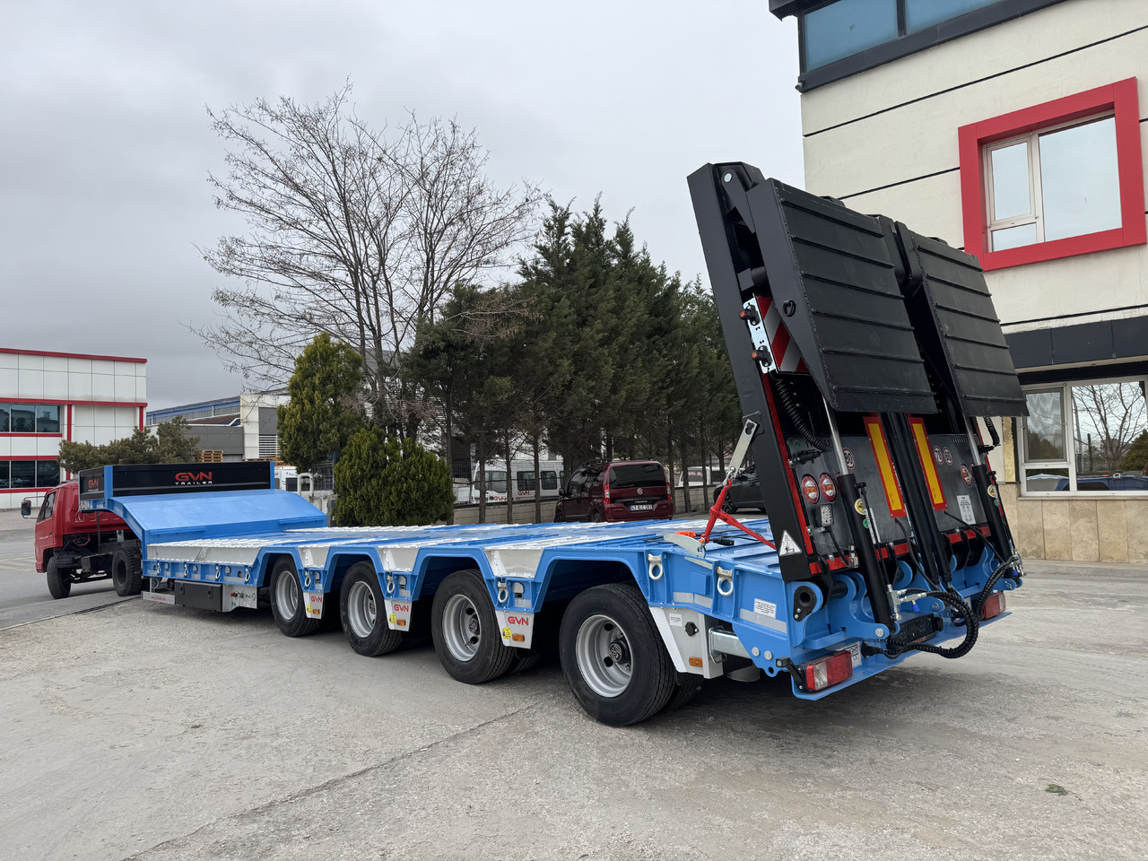 GVN Trailer 4 AXLE LOWBED WITH WHEEL RECESSES - عربة مسطحة منخفضة نصف مقطورة: صور 1 GVN Trailer 4 AXLE LOWBED WITH WHEEL RECESSES - عربة مسطحة منخفضة نصف مقطورة: صور 1