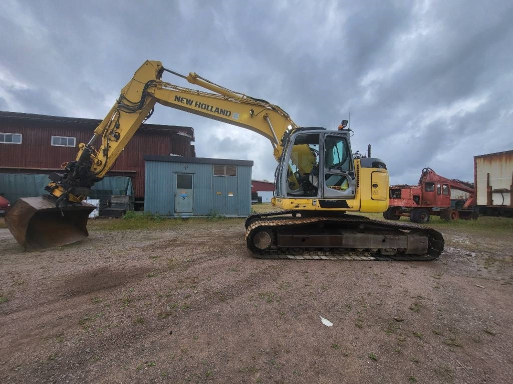 New Holland Kobelco E 235 B SR-2 - حفارات زحافة: صور 2 New Holland Kobelco E 235 B SR-2 - حفارات زحافة: صور 2
