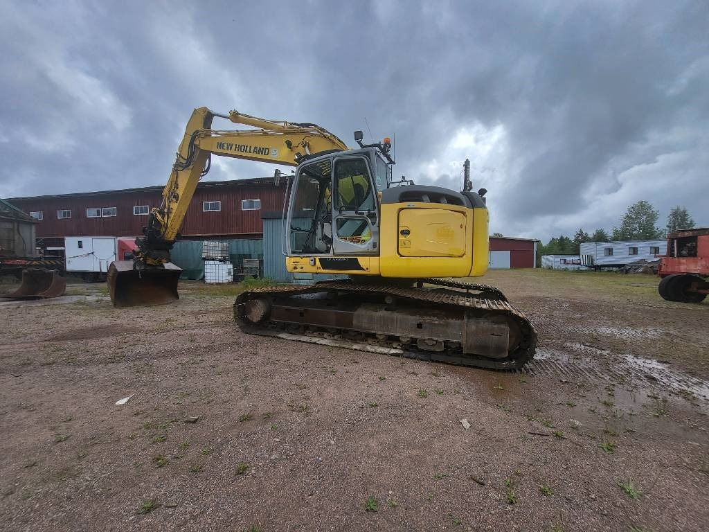 New Holland Kobelco E 235 B SR-2 - حفارات زحافة: صور 3 New Holland Kobelco E 235 B SR-2 - حفارات زحافة: صور 3